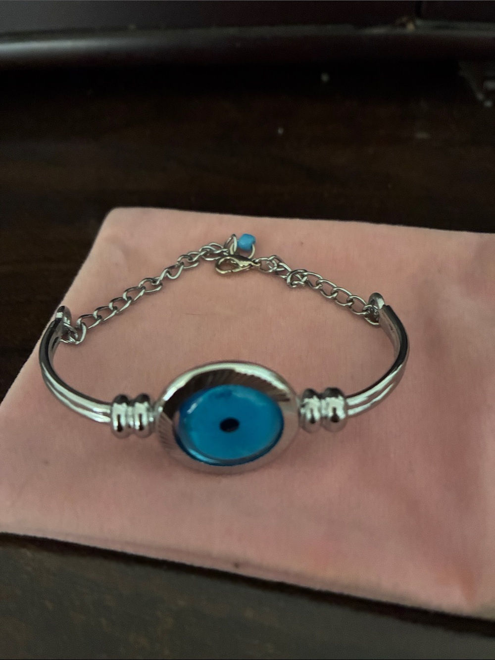 Silver-Tone Bracelet with Blue Evil Eye Accent